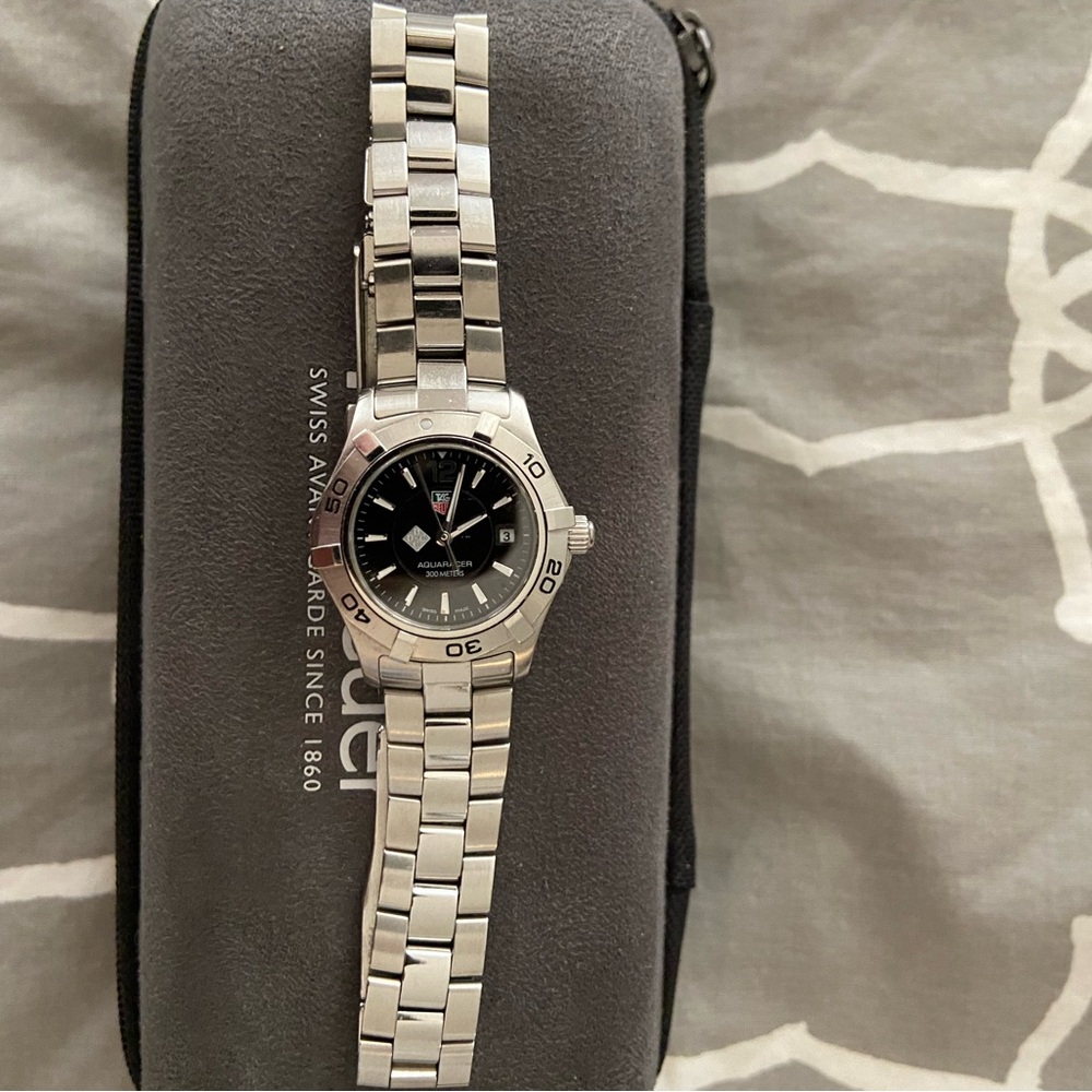 Tag Heuer women’s Aquaracer watch. Style #WAF1410.BA0823. Excellent condition.